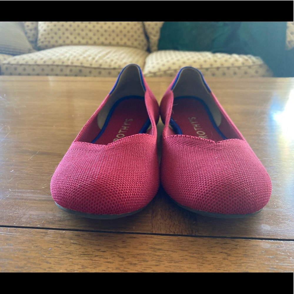 Rothy’s “the flat” in scooter red